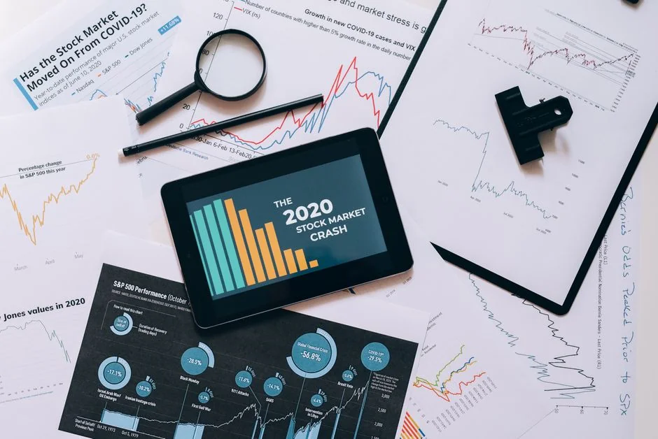 Person analyzing cryptocurrency data using a laptop, highlighting financial insights.